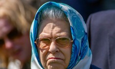 Полюбила корги, купила 5 тысяч шапок и поехала на джипе: редкие фото Елизаветы II, которую мы не знали