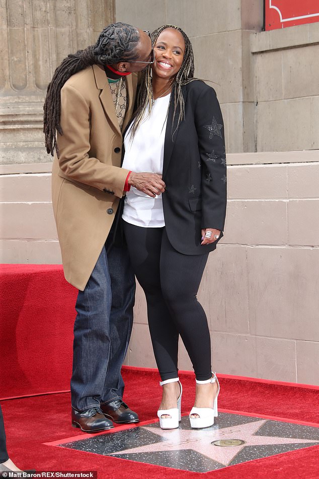 Снуп со своей женой Шанте Бродус, ранее Тейлор, получает звезду на Аллее славы в Голливуде в 2018 году.